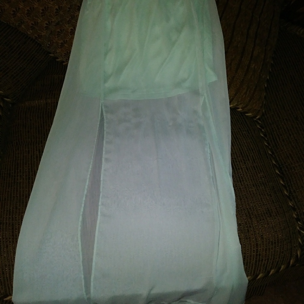 Sheer dress with mini skirt inside